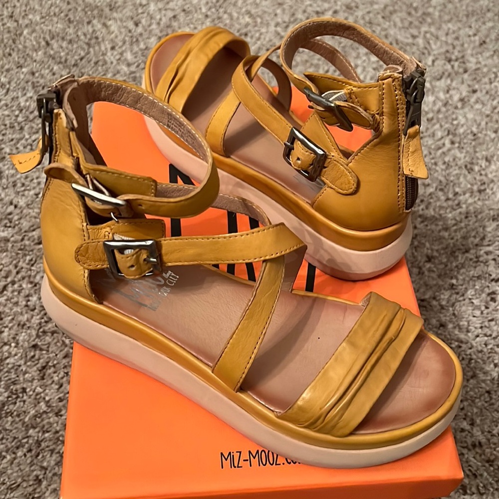 MizMooz sandals.Yellow.Zipper on the back.Adjustable buckles.Great condition